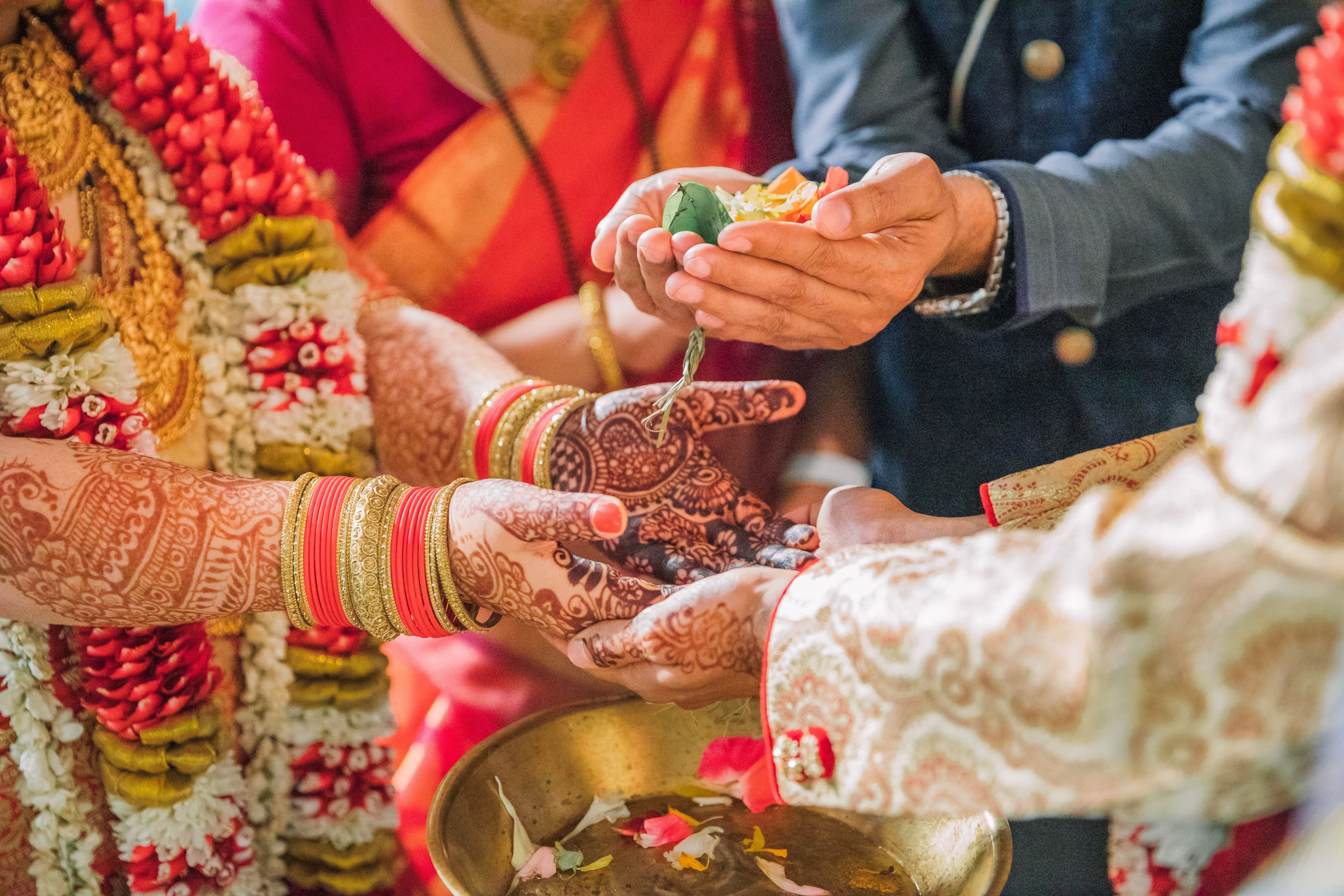 The Wedding Ring, Kitchener Public Library, Peter B Photography, KW wedding photographer, Kitchener wedding venue, Waterloo wedding venue, Cambridge wedding venue, bride and groom holding hands in religious ceremony