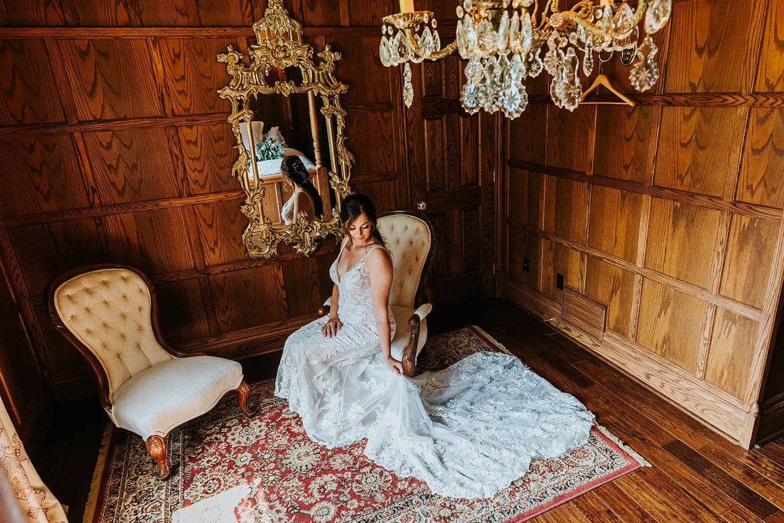 Erin Estates, Wedding Venue, Fedora Media, Cambridge Wedding Photographer, Bride sitting a chair with her gown all around her