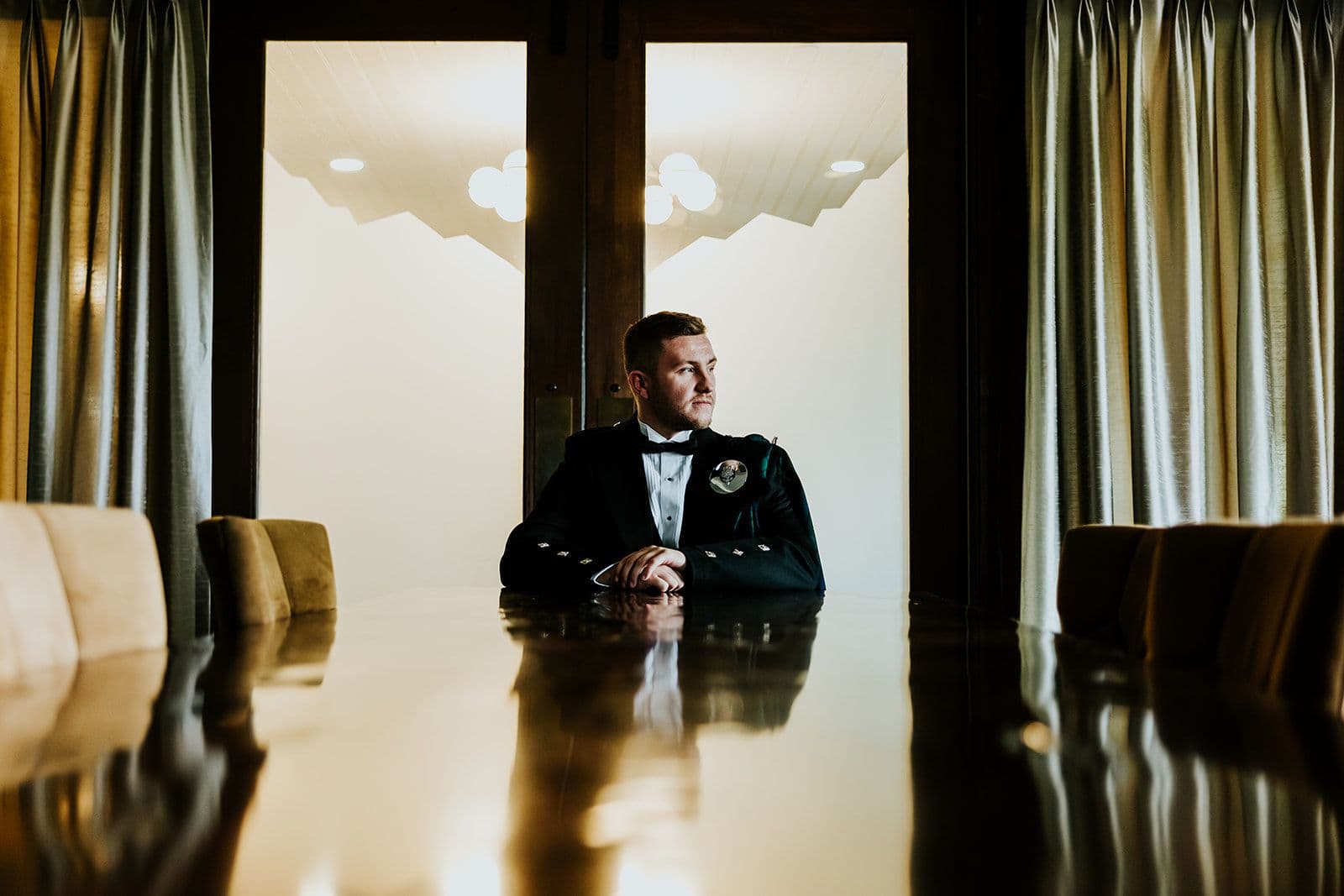The Wedding Ring, Whistle Bear Golf Club, Wedding Venue, Kitchener Waterloo Wedding Venue, Fedora Media, Kitchener Wedding Photographer, Groom standing in doorway with the sun behind him